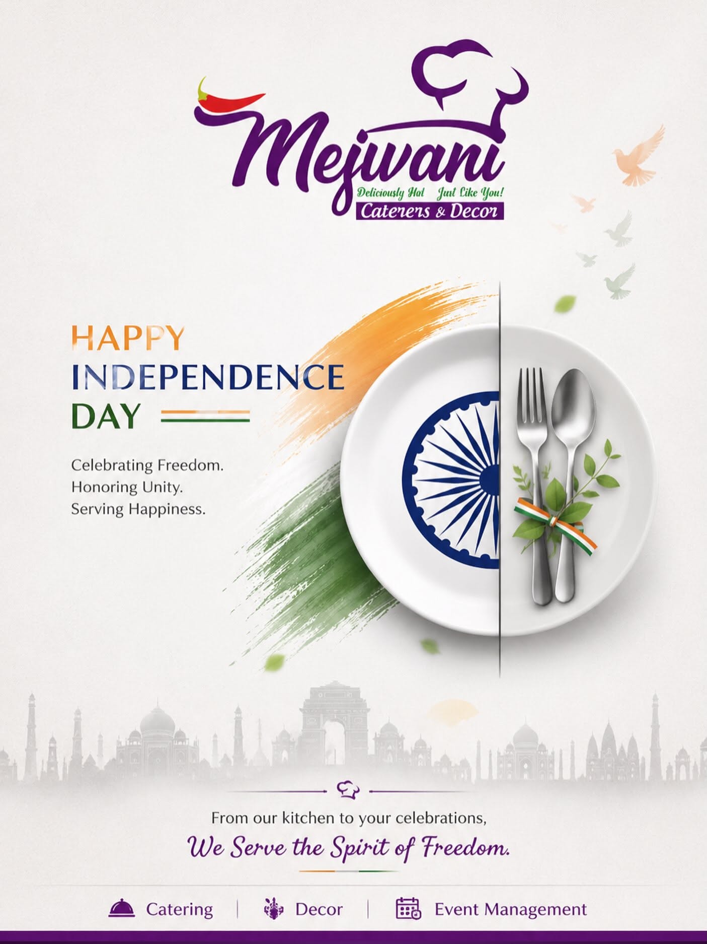 White plate with a half Ashoka Chakra and cutlery tied with a tricolour ribbon