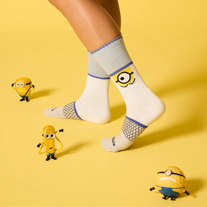 Socks Brands creative ad: Minions create playful scale contrast