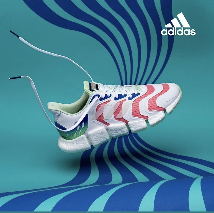 Creative ad: Floating white running shoe with coral and blue accents