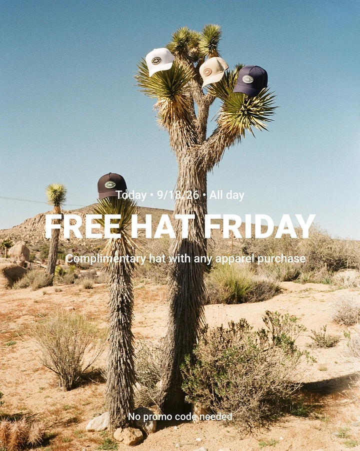 Hats & Caps creative ad: Unexpected caps on tree composition.