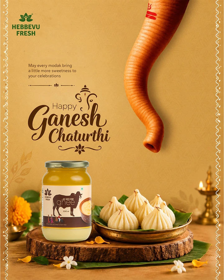 Ganesh Chaturthi creative ad: Ghee jar beside a brass plate of modaks with a Ganesha trunk descending from above