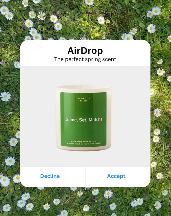 Candles & Home Fragrance creative ad: Green-label candle in a mock iPhone AirDrop popup over a daisy lawn