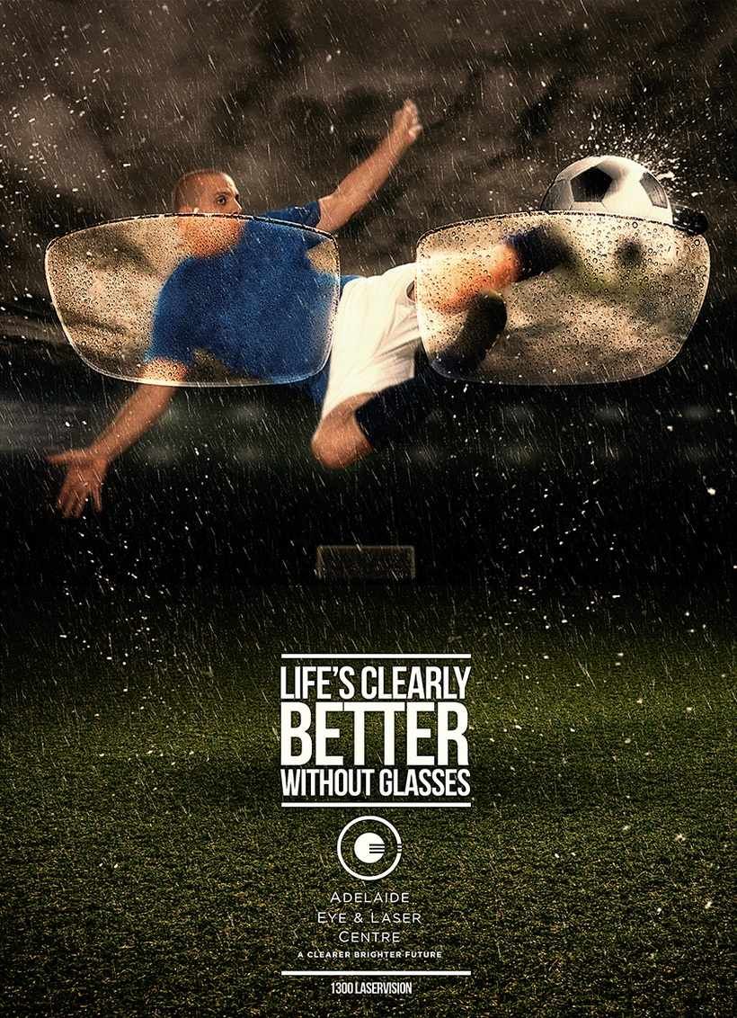 Footballer mid-bicycle-kick seen through rain-covered eyeglass lenses