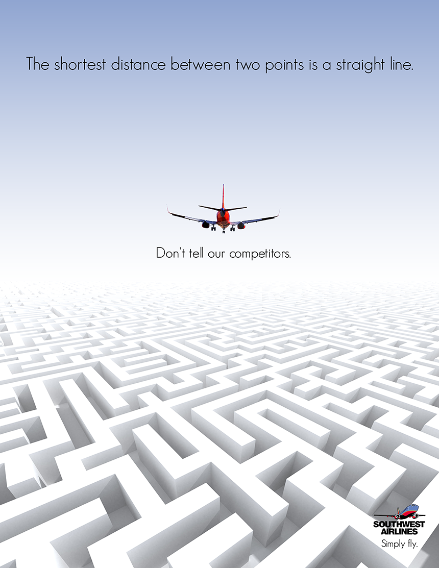 Red airliner flying straight above an endless white maze