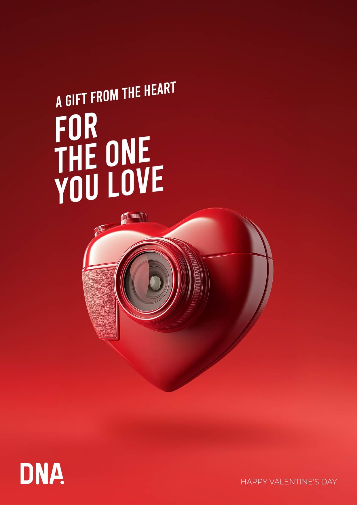 Glossy red heart-shaped camera floating