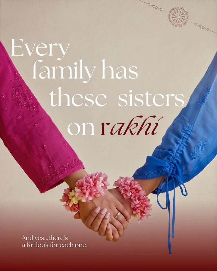 Raksha Bandhan creative ad: Two sisters' hands clasped, in magenta and blue embroidered kurta sleeves