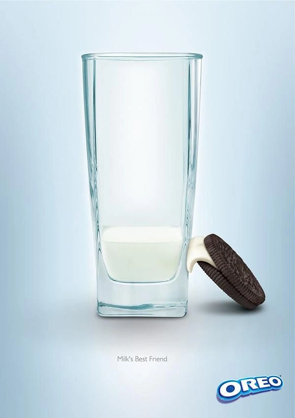 Sweet Shop creative ad: Cookie leaning on a glass of milk with a milk drip