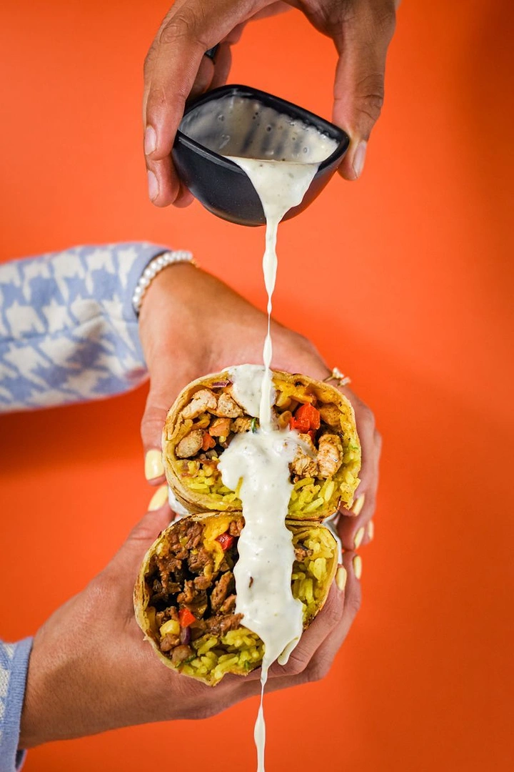 Mexican Restaurants creative ad: Dramatic crema-pour taco composition