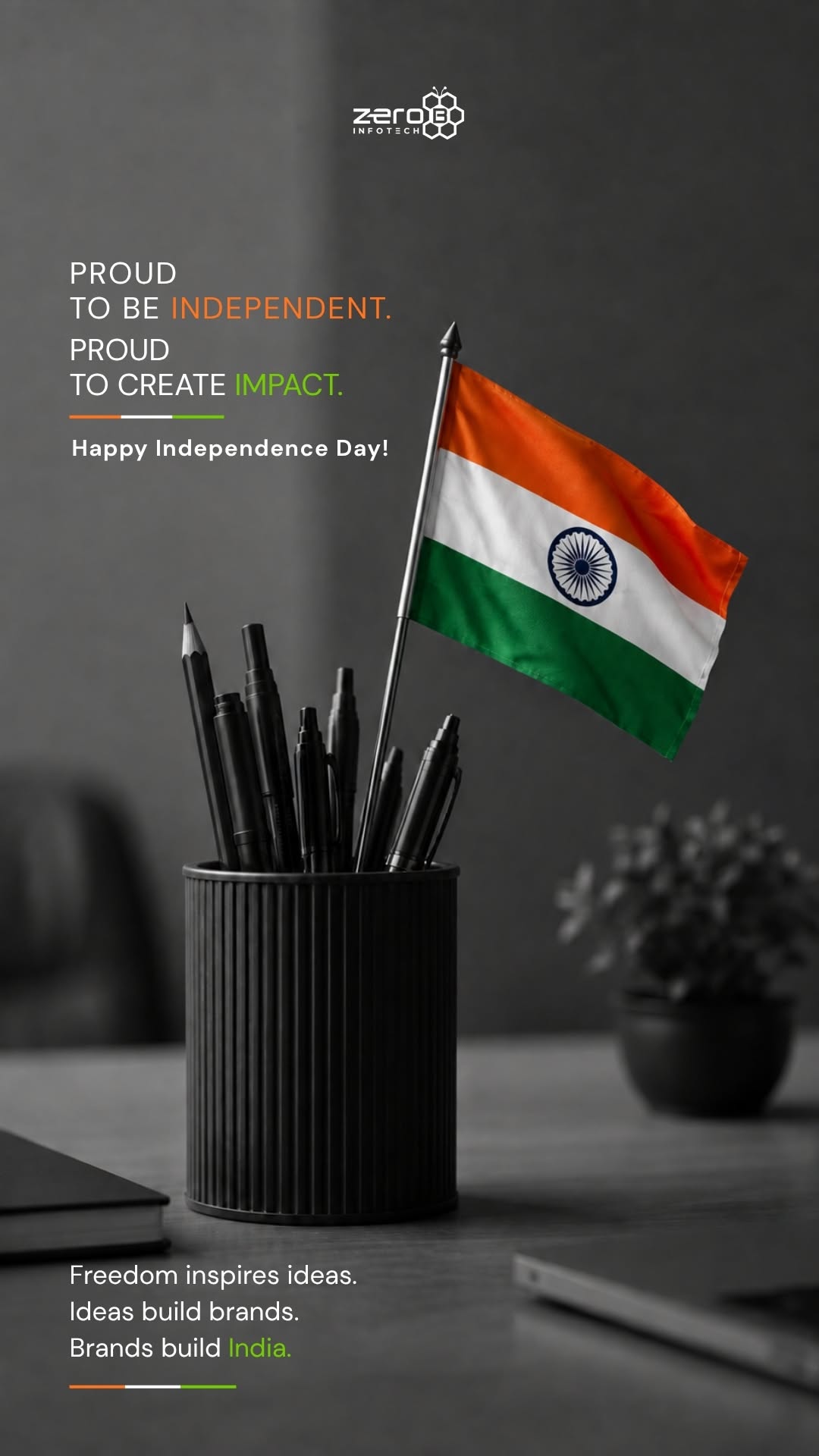 Small Indian flag in a black pen holder on an office desk