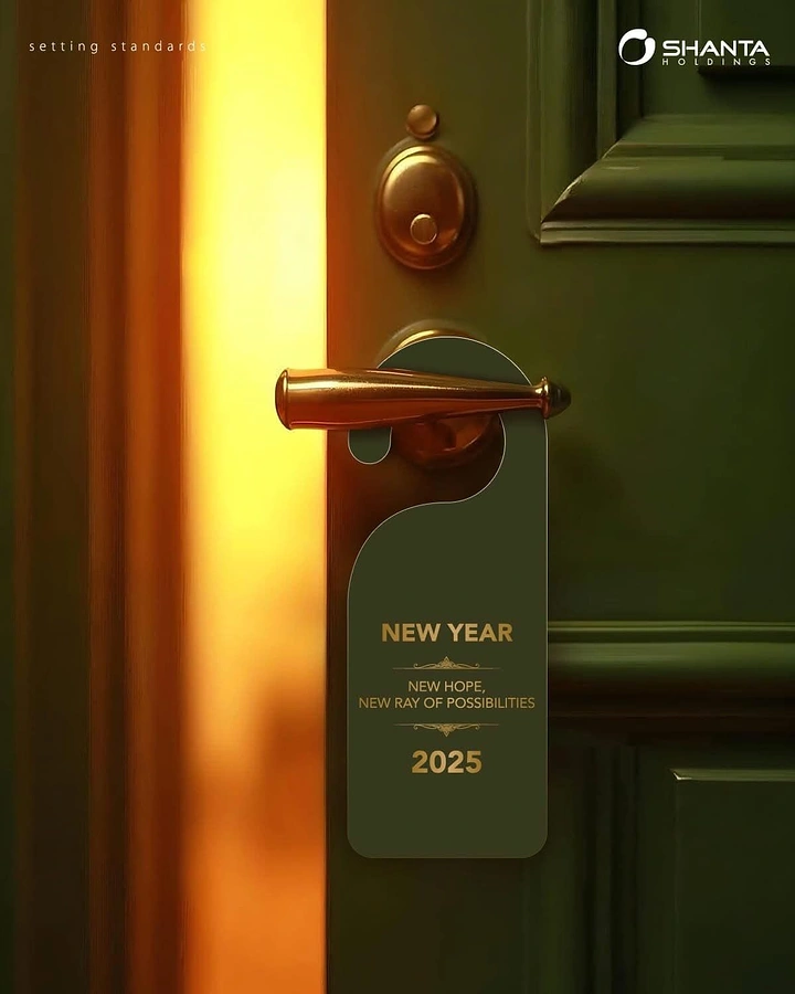 New Year creative ad: Door hanger on a brass handle of a slightly open green door