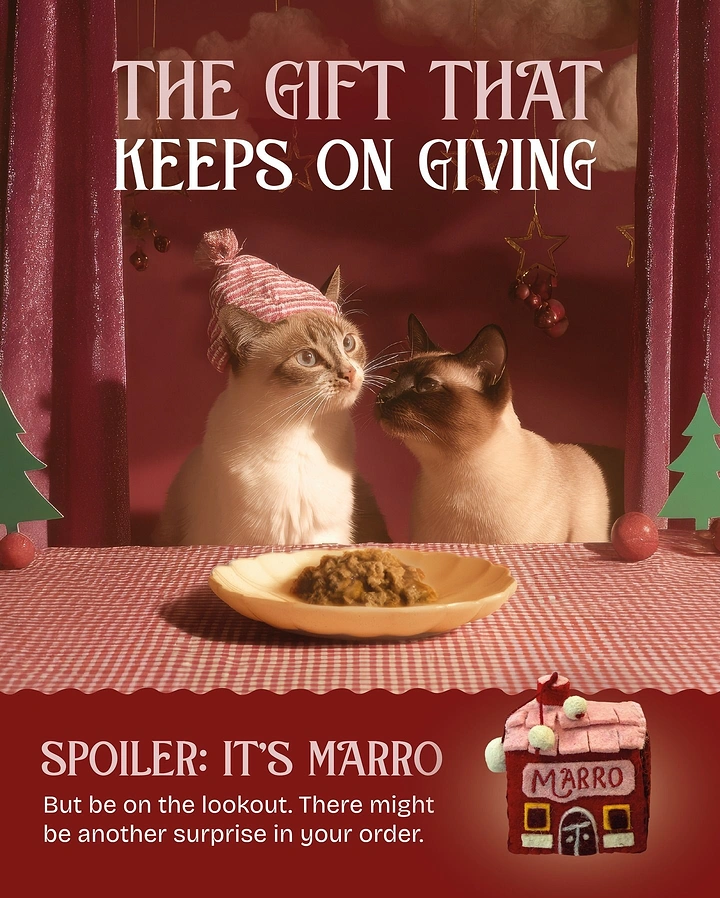 Christmas creative ad: Two cats nuzzling over a dish of food