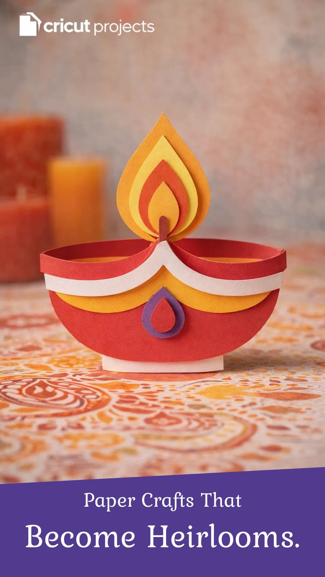Diwali Story: Layered paper-craft diya on a paisley cloth