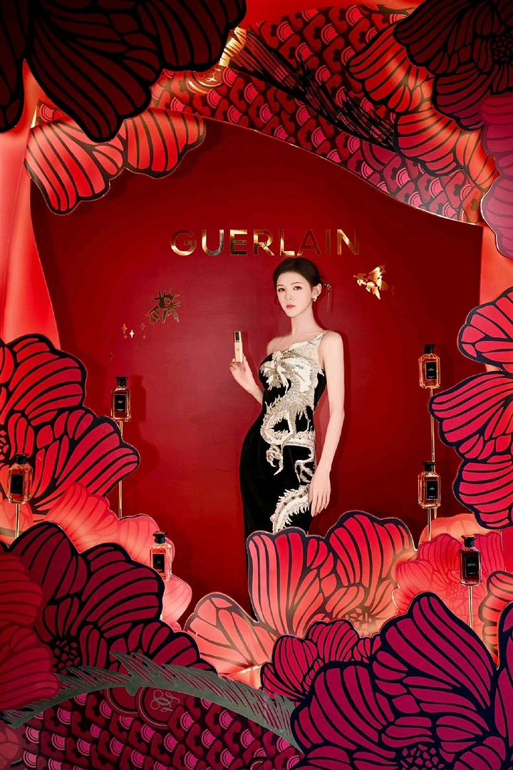 Lunar New Year creative ad: Model in dragon-embroidered black gown holding foundation in red floral set