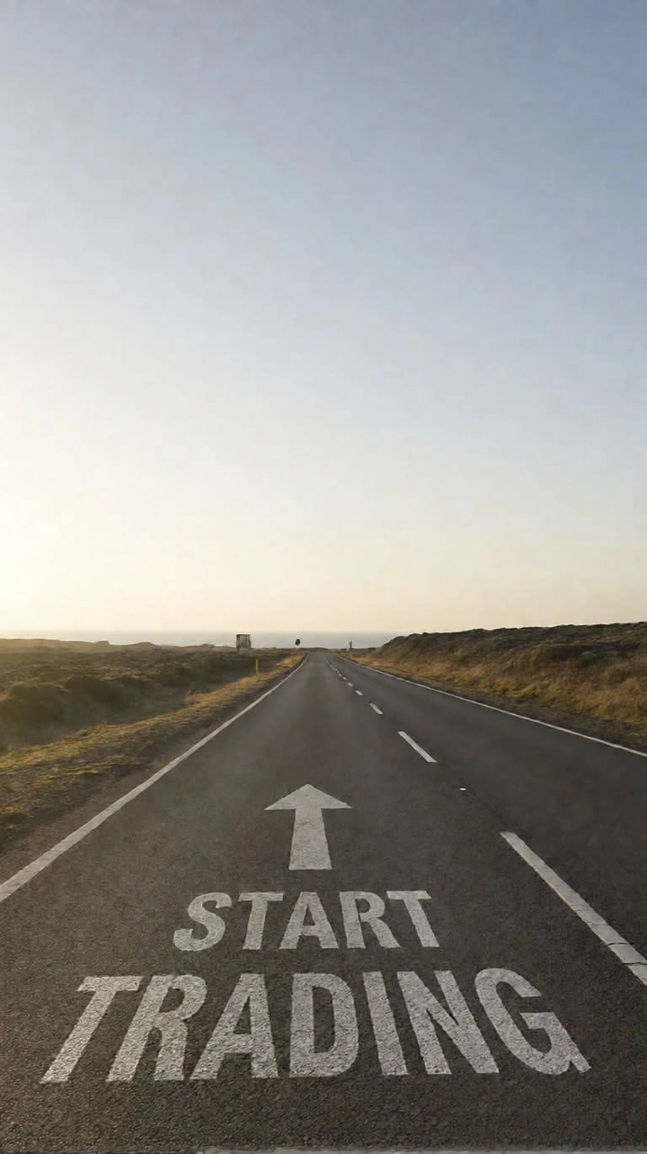 Stock Brokers & Investing creative ad: Road marking reads 'Start Trading' metaphor