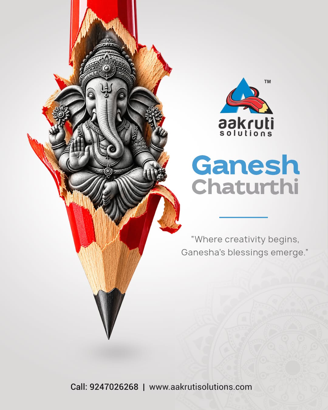 Silver Ganesha idol emerging from a sharpened red pencil