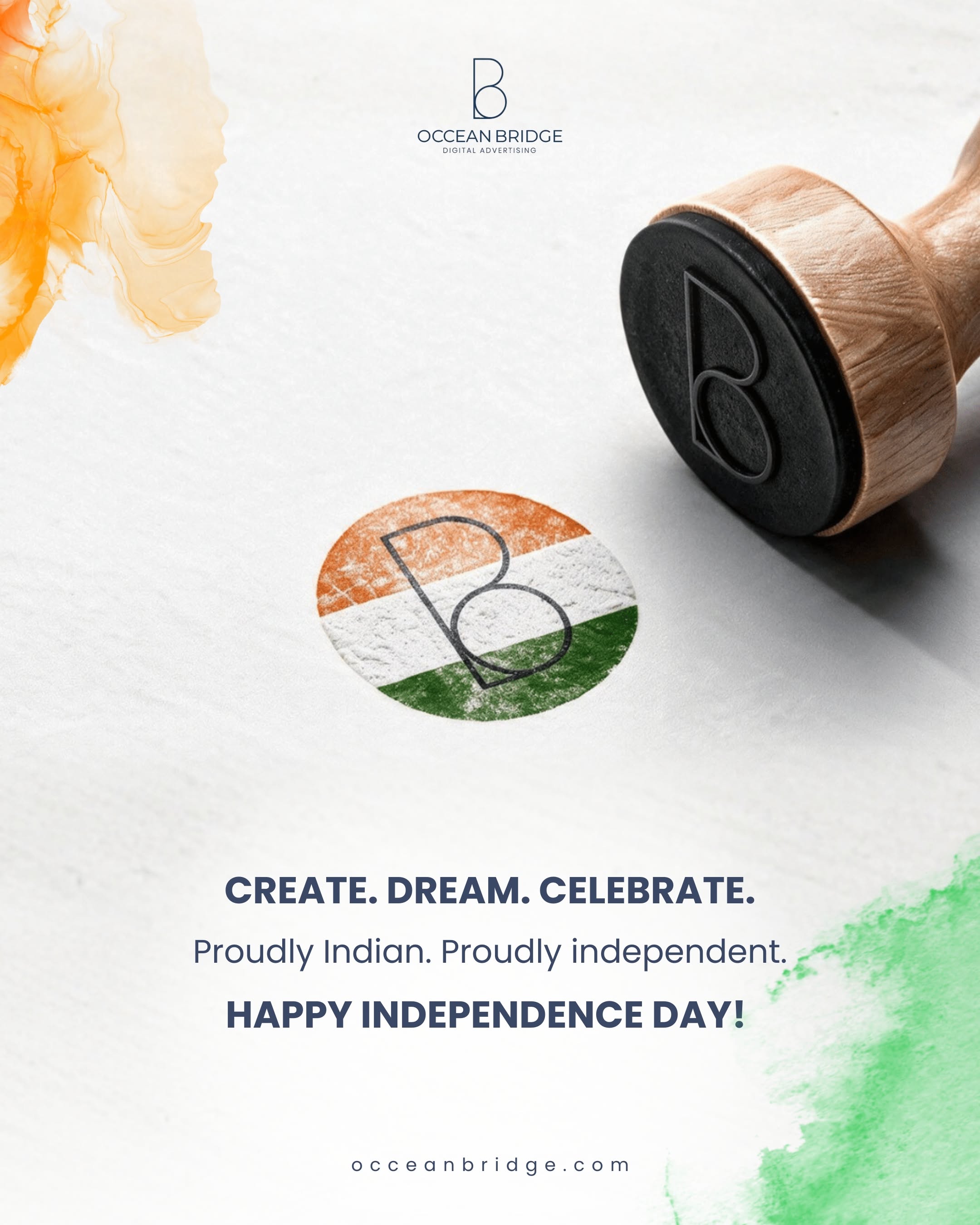Wooden rubber stamp beside a tricolour logo impression on paper