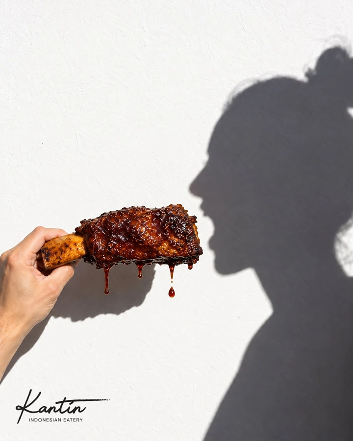 BBQ & Grill Restaurants creative ad: Unexpected isolated steak and dramatic shadow