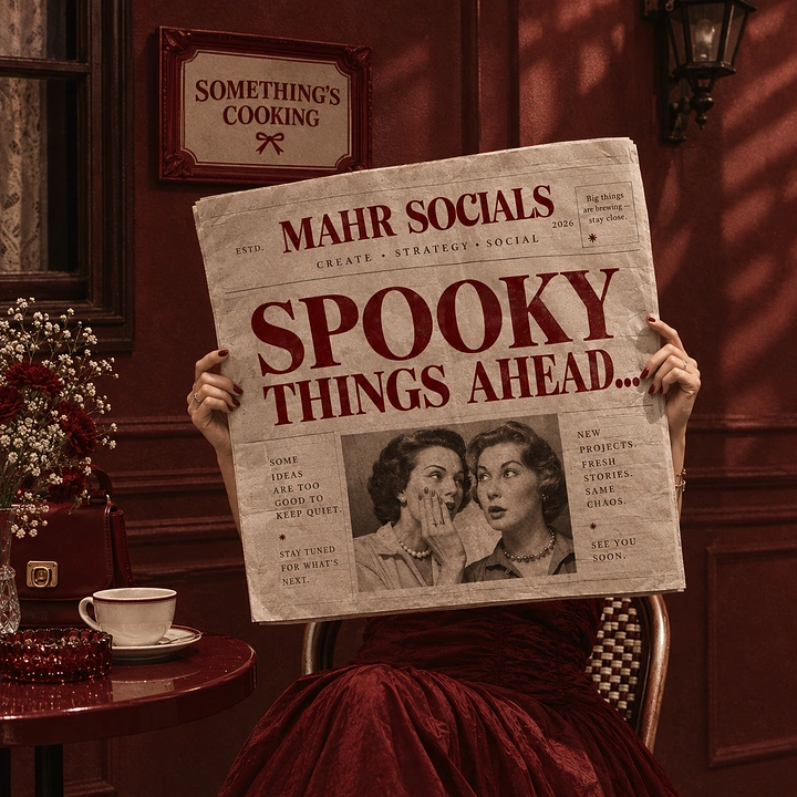 Halloween creative ad: Woman in burgundy gown holding up a vintage newspaper teaser