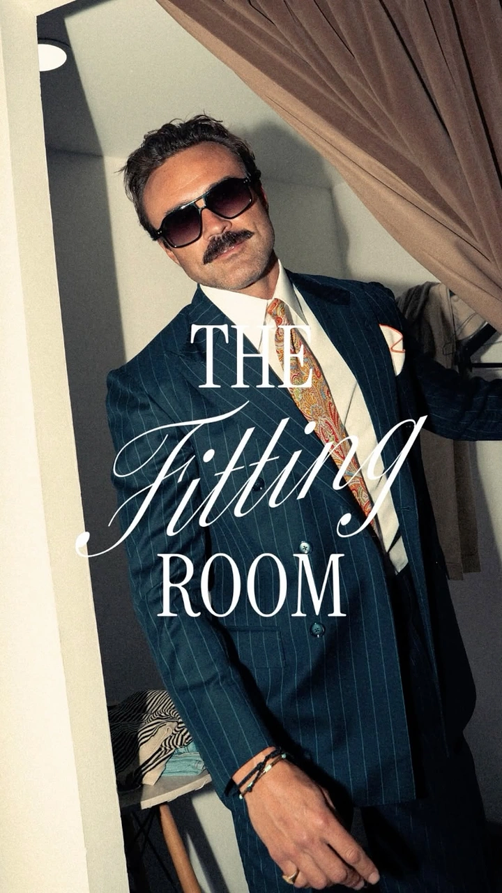 Men's Suits & Formal Wear creative ad: Fitting-room curtain creates memorable framing