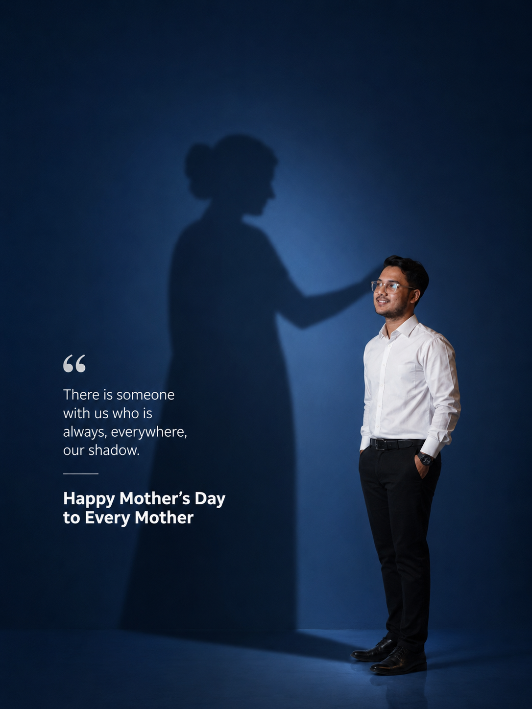 Young man whose shadow on the wall is his mother touching his head