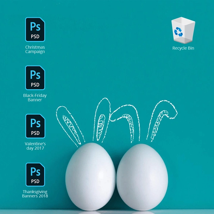 Easter creative ad: Two white eggs with chalk bunny ears on a mock desktop