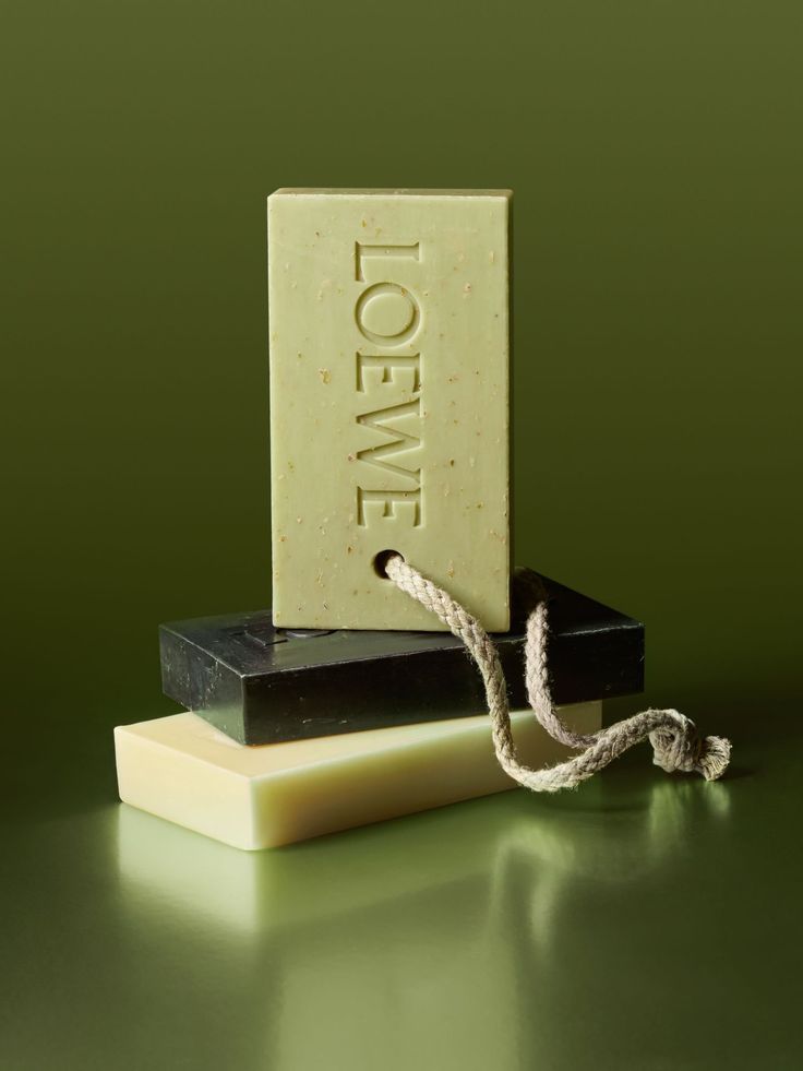 Instagram post: Stack of three soap bars, top bar on a rope