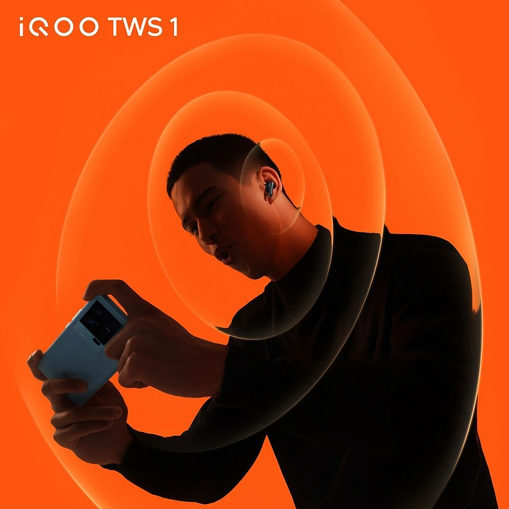 Telecom creative ad: Man gaming on a phone while wearing an earbud, inside glowing sound rings