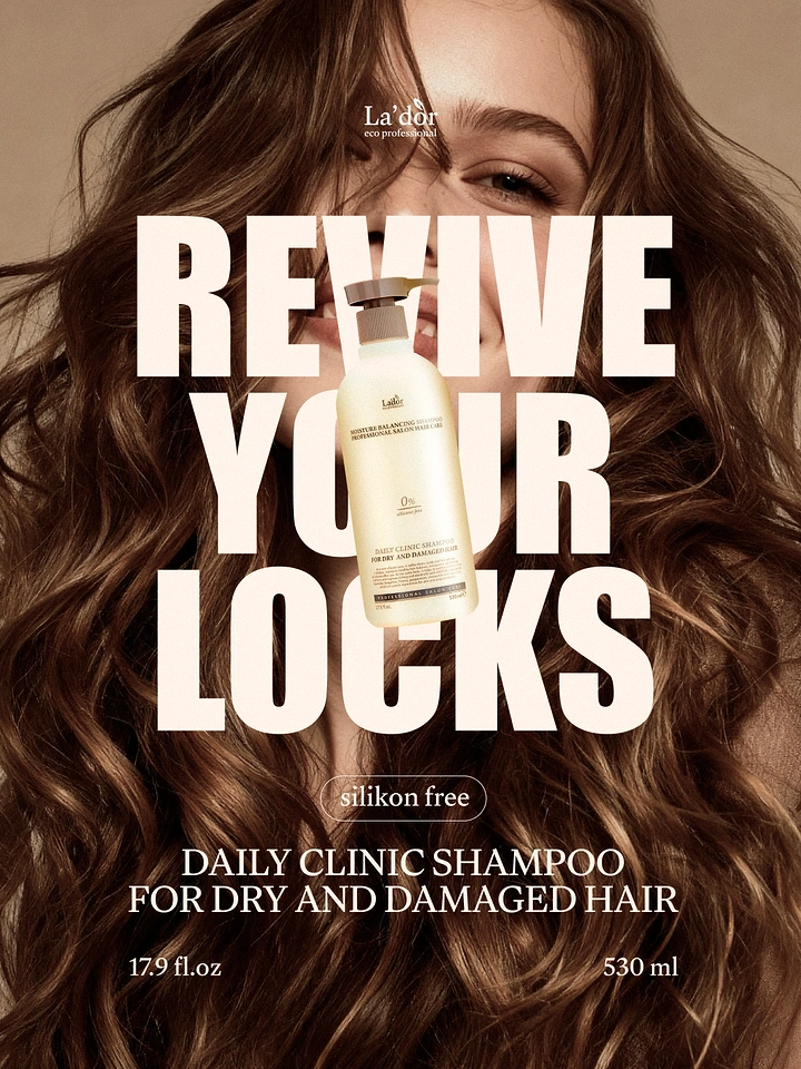 Creative ad: A smiling woman with voluminous wavy brown hair, with the shampoo bottle over her face