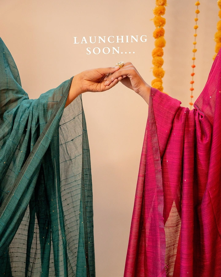 Ethnic Wear & Sarees creative ad: Two saree drapes, hands meeting as teaser