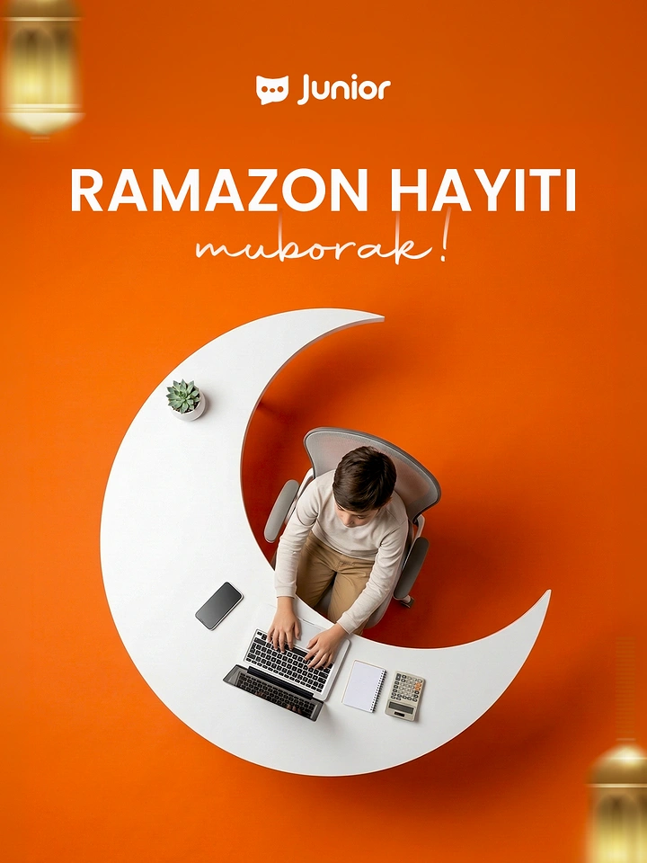Eid creative ad: Top-down view of a boy working at a laptop on a crescent-moon-shaped white desk