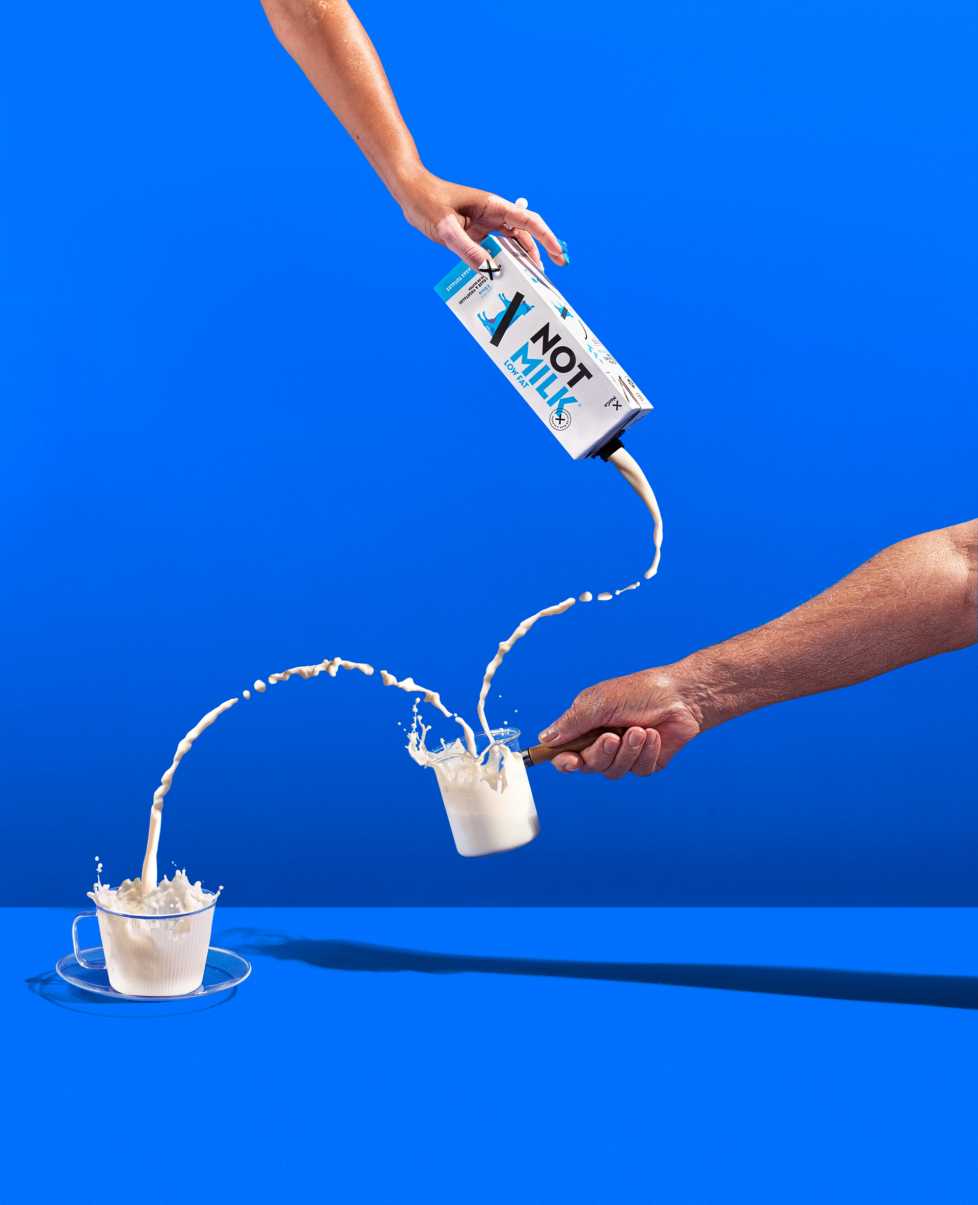 Instagram post: Long-distance pour, playful stunt composition