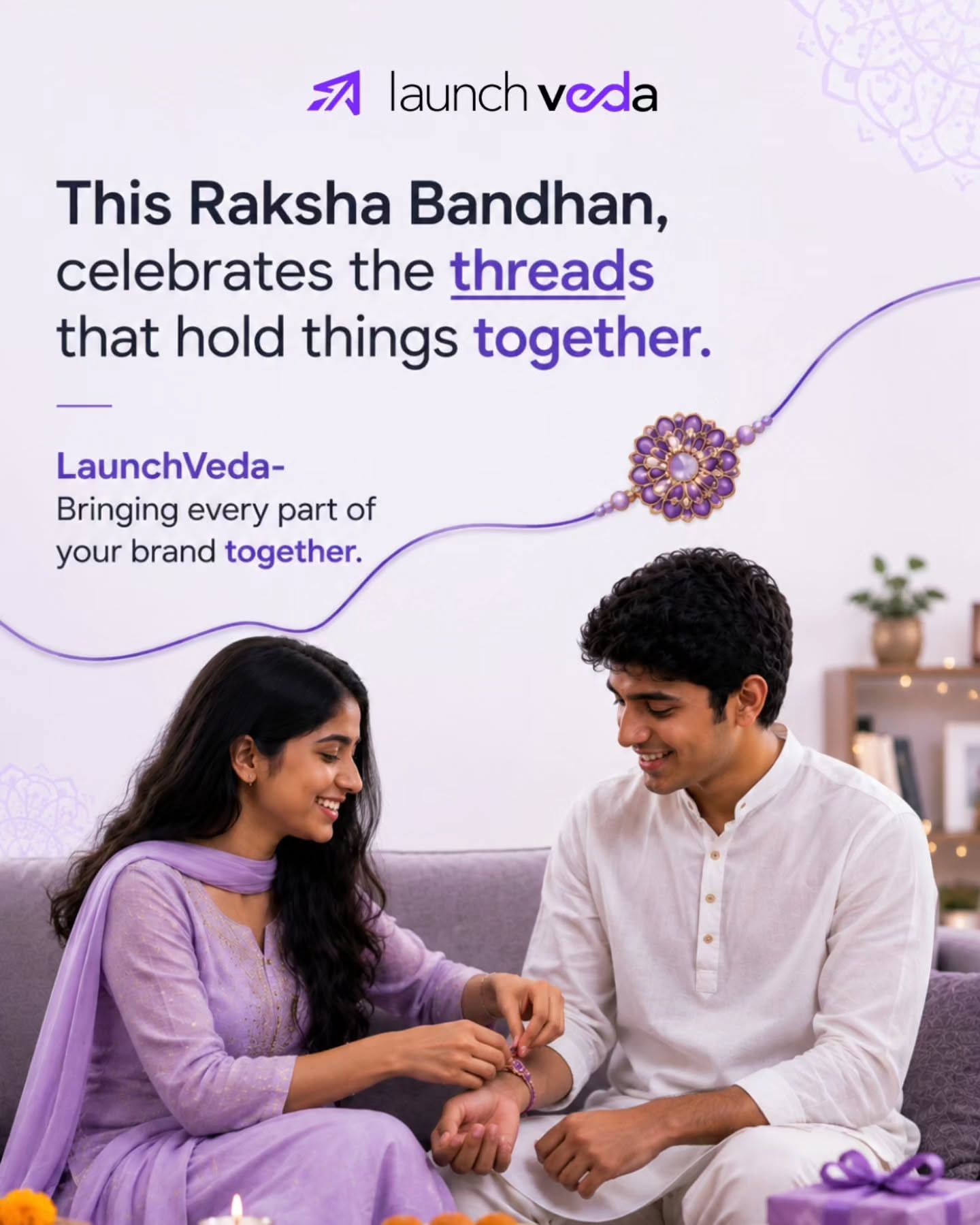 Sister tying a rakhi on her brother on a lilac sofa
