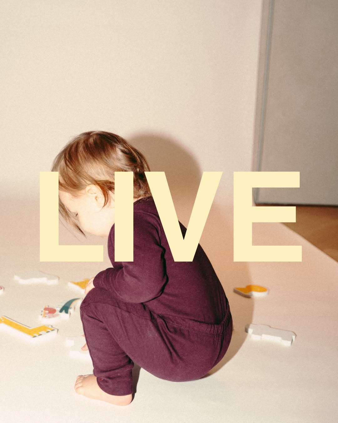 Instagram post: Child tucked into LIVE typography