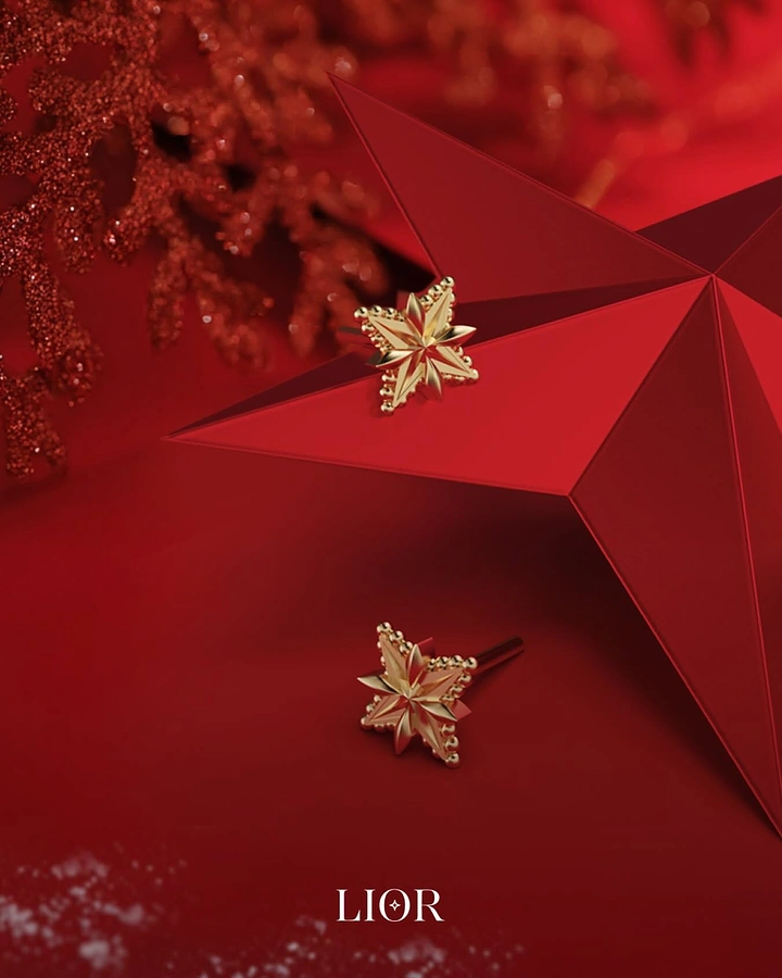Christmas creative ad: Gold star-shaped stud earrings on a red faceted star