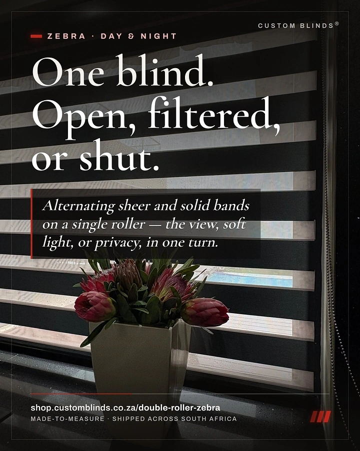 Curtains & Blinds creative ad: Zebra roller blind with vase of proteas