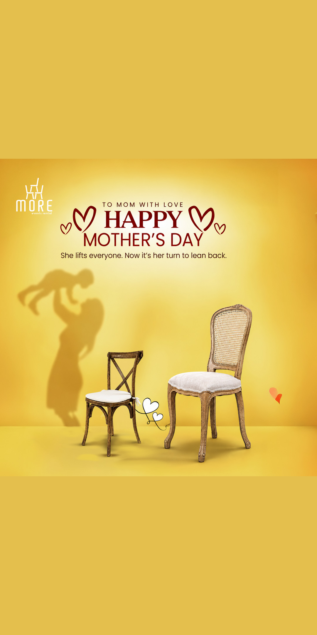 Small and large wooden chairs with a mother-lifting-child shadow