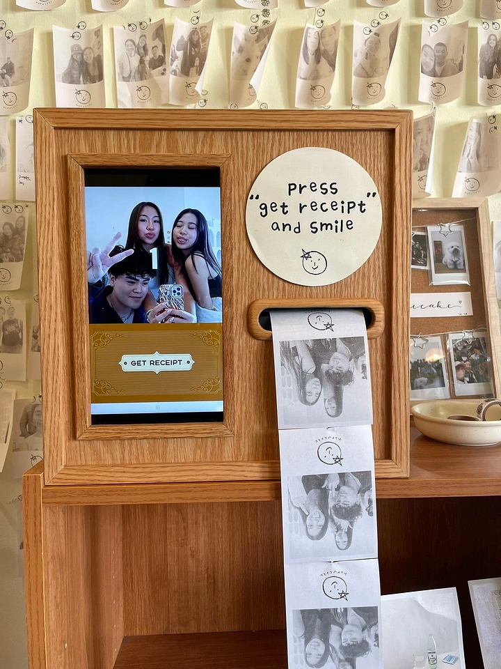 Photo Booth Rentals creative ad: Receipt interaction becomes playful invitation