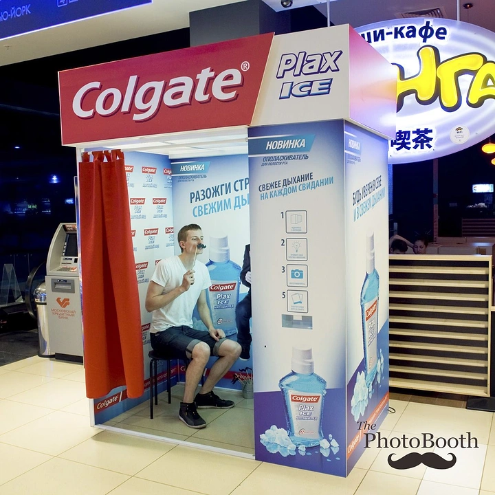 Photo Booth Rentals creative ad: Unexpected branded vending-booth activation