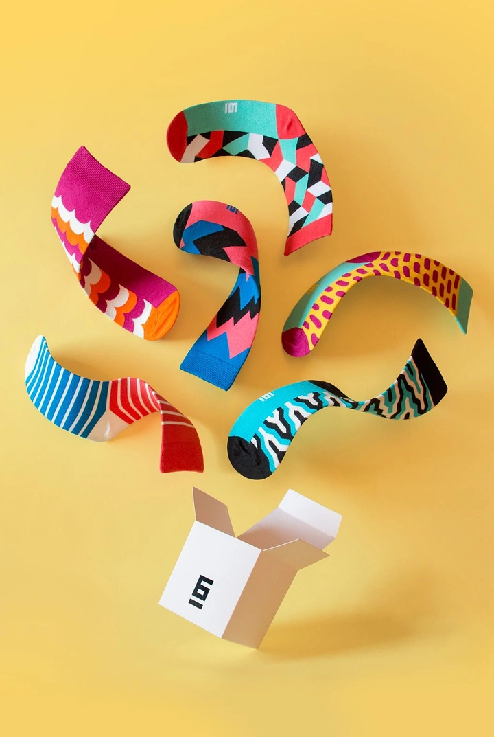 Socks Brands creative ad: Colorful socks form abstract brand composition