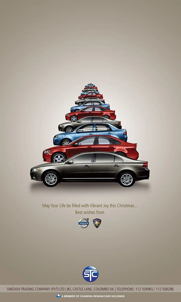 Christmas creative ad: Sedans stacked in shrinking sizes to form a Christmas tree