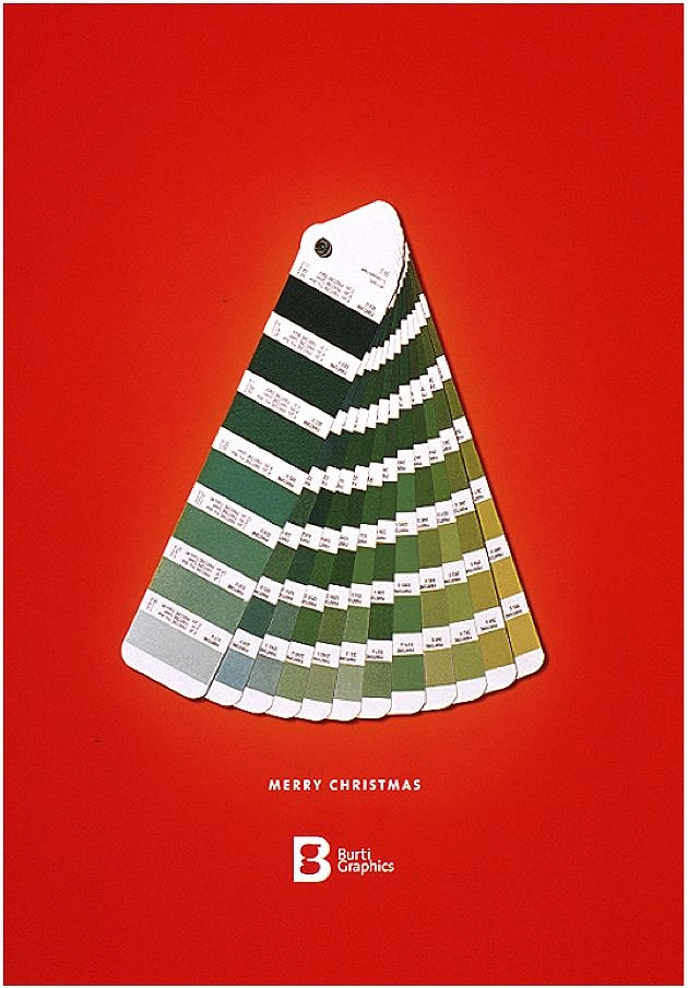 Christmas creative ad: Fanned green colour-swatch book forming a Christmas tree