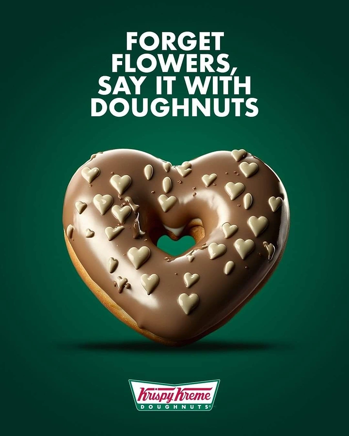 Valentine's Day creative ad: Floating heart-shaped chocolate-glazed doughnut