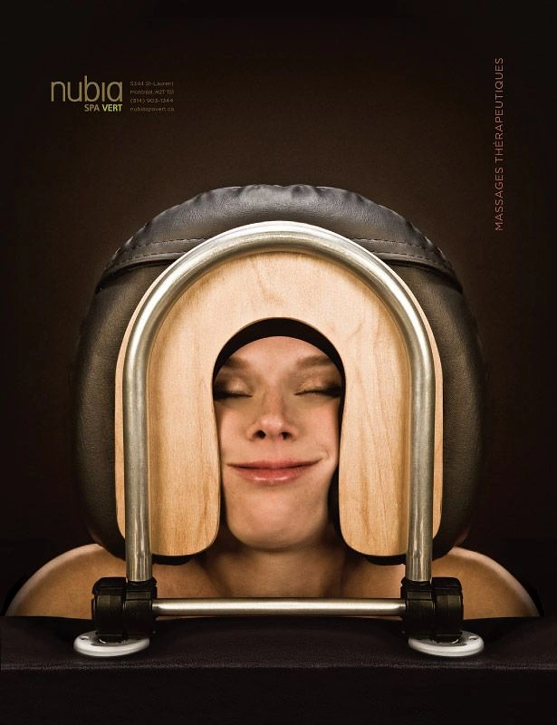 Spa & Massage creative ad: Striking face-cradle portrait, unexpected composition