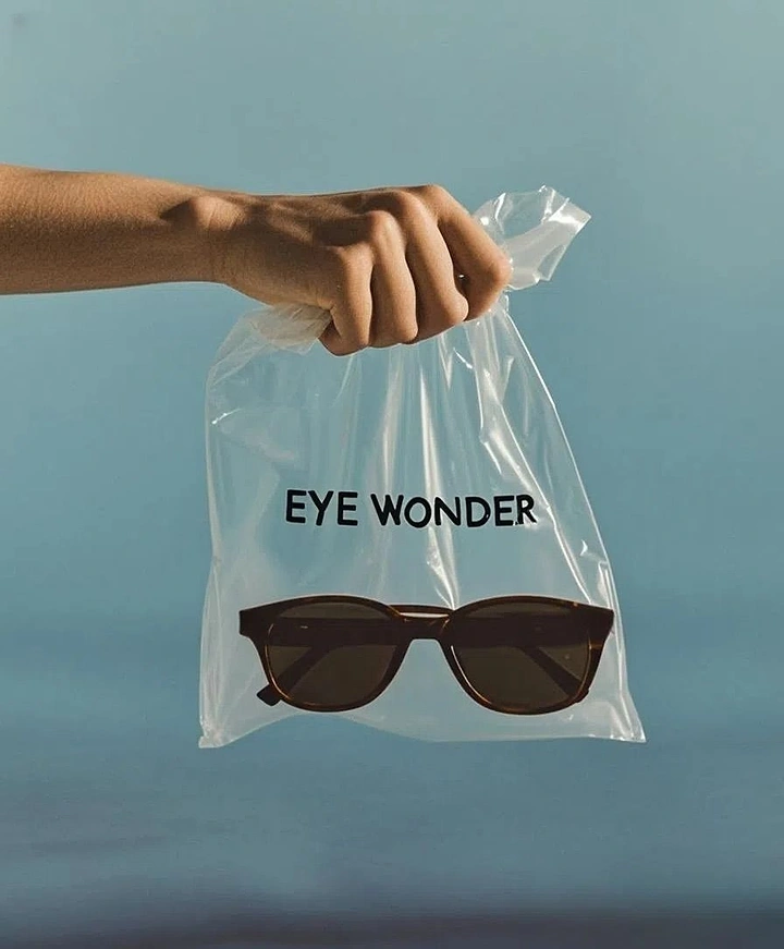Opticians & Eye Care creative ad: Sunglasses in goldfish bag, 'Eye Wonder'