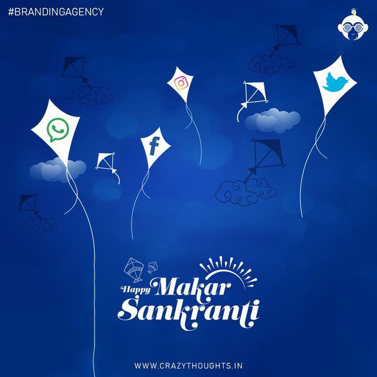 White kites bearing social media logos flying in blue sky