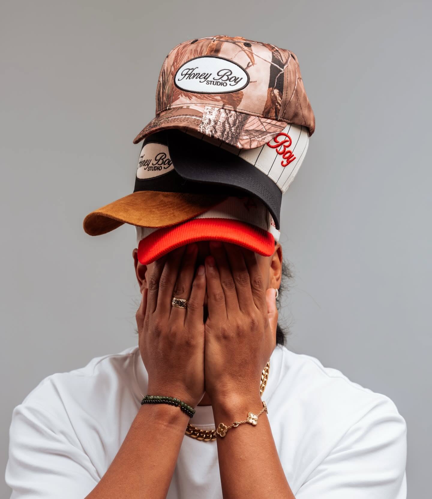 Instagram post: Stacked caps create playful face-covering idea