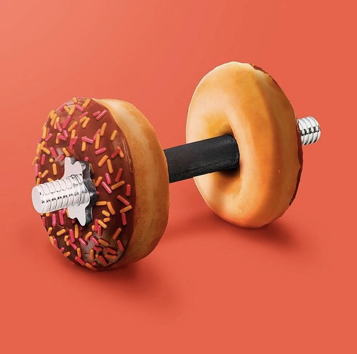 Fitness Equipment Stores creative ad: Memorable donut dumbbell visual pun