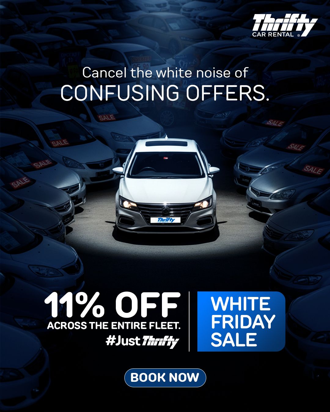 Black Friday Instagram post: Single white sedan spotlit amid dark rows of cars with sale stickers
