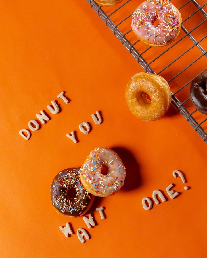 Donut Shops creative ad: Physical donuts stage witty craving copy