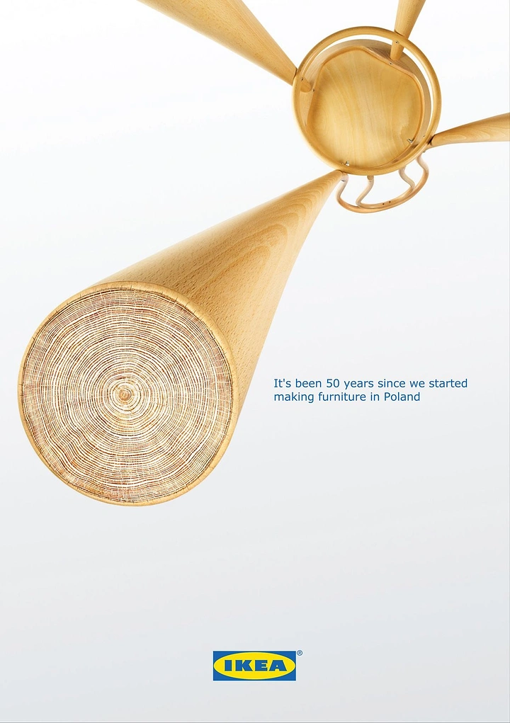 Creative ad: Stool viewed from below with one leg ending in tree growth rings